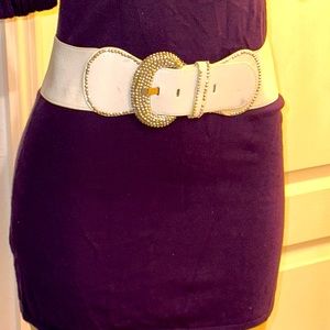 Belt has some wear few stone gave fallen fits most size stretches